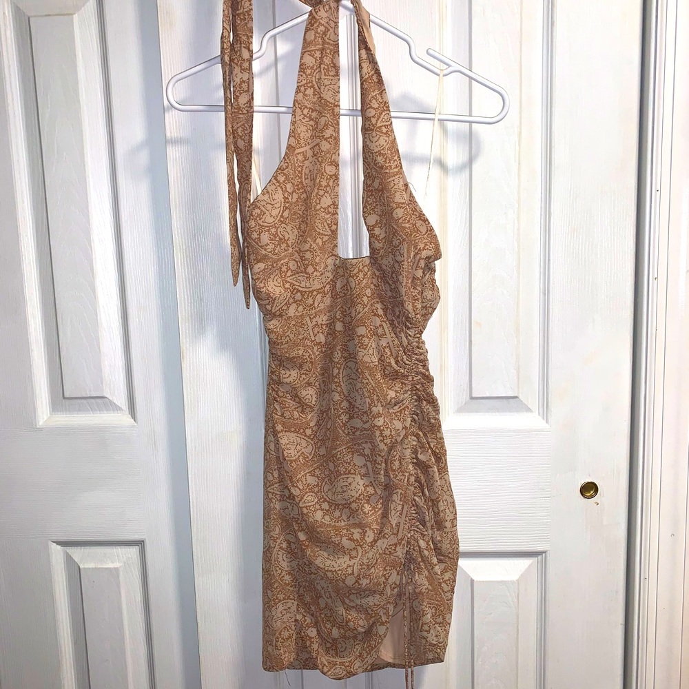 Brand new unworn dress. Says size small- fits as a xs. Just doesn’t fit me :(